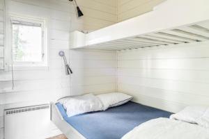 Postel nebo postele na pokoji v ubytování First Camp Mörudden-Karlstad