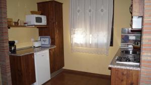 Kuchnia lub aneks kuchenny w obiekcie Apartamentos Rurales Monfragüe