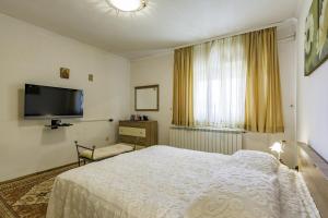 TV a/nebo společenská místnost v ubytování Apartment Kraljevic