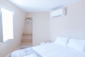 
A bed or beds in a room at FeelCoimbra Castelo Boutique Apartments

