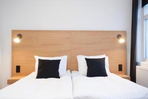 Postel nebo postele na pokoji v ubytování 201 Hotel