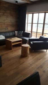 Posezení v ubytování Wildererhütte Chalet Helmut