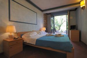 Säng eller sängar i ett rum på Hotel Solitudo