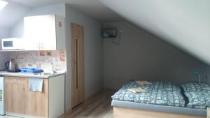 Postel nebo postele na pokoji v ubytování Penzión VIAN