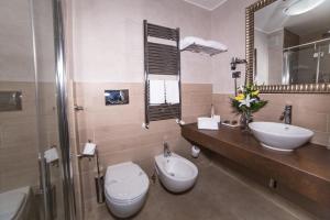 Koupelna v ubytování Hotel Patavium