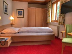Postel nebo postele na pokoji v ubytování Hotel Both