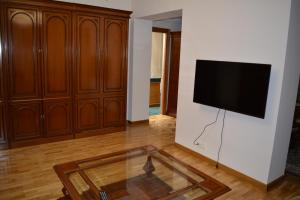 TV a/nebo společenská místnost v ubytování Apartamentos Alameda