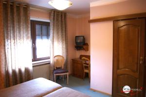 Postel nebo postele na pokoji v ubytování Hotel il Castello Borghese