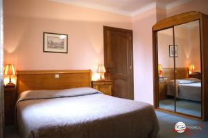 Postel nebo postele na pokoji v ubytování Hotel il Castello Borghese
