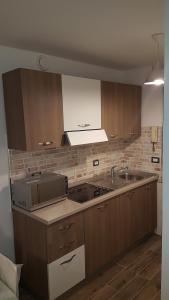A kitchen or kitchenette at Sweet House