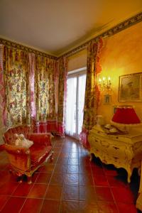 Postel nebo postele na pokoji v ubytování B&B La Maison degli Angeli