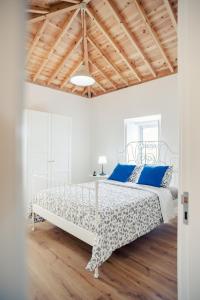 Postel nebo postele na pokoji v ubytování Villa Mariense