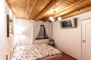 Postel nebo postele na pokoji v ubytování Chalupka