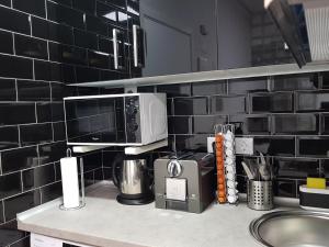 Kuchyň nebo kuchyňský kout v ubytování Argüelles Apartment