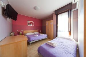 Letto o letti in una camera di Hotel Albi