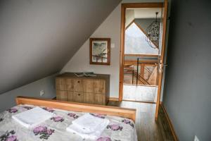 Voodi või voodid majutusasutuse Country House Selo toas