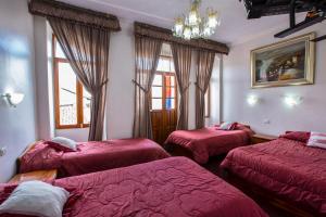 Postel nebo postele na pokoji v ubytování Hotel Plaza del Teatro