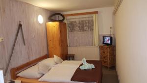 Postel nebo postele na pokoji v ubytování Penzion Vanessa