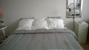 Cama ou camas em um quarto em Koskikatu Apartment