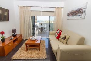 Et opholdsområde på Apartamentos Turisticos Rocha Tower - MI