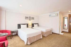Voodi või voodid majutusasutuse Dinh Ami Hanoi Hotel toas
