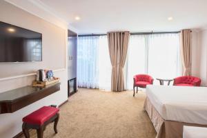 Voodi või voodid majutusasutuse Dinh Ami Hanoi Hotel toas