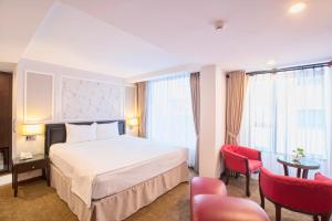 Voodi või voodid majutusasutuse Dinh Ami Hanoi Hotel toas