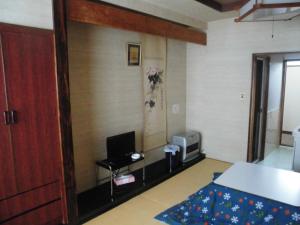 TV a/nebo společenská místnost v ubytování Lodge Villa Happo