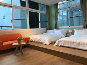 En eller flere senge i et værelse på Zhai Nan