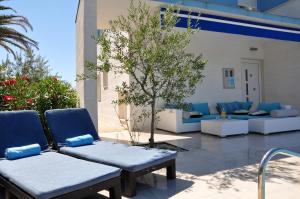 Posedenie v ubytovaní Family Villa Mermaid Your Croatian Haven with Pool and Scenic Views