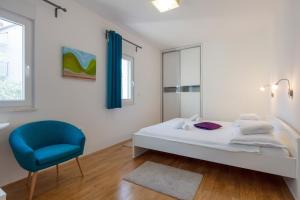 Posteľ alebo postele v izbe v ubytovaní Family Villa Mermaid Your Croatian Haven with Pool and Scenic Views