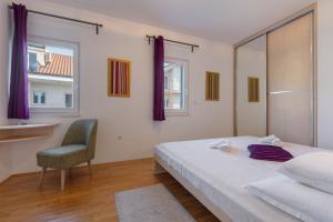 Posteľ alebo postele v izbe v ubytovaní Family Villa Mermaid Your Croatian Haven with Pool and Scenic Views + 37 fotografií