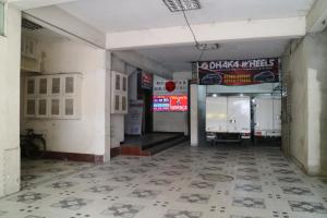 an empty hallway of a building with a garage at Japanese lodge hydrangea in Dhaka