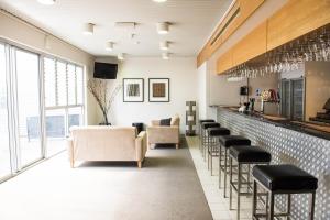 Χώρος καθιστικού στο Capella Coach Inn