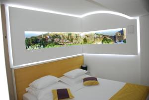 Katil atau katil-katil dalam bilik di Hotel Boutique Libris