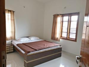 Letto o letti in una camera di BrickNest homes