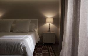 Posteľ alebo postele v izbe v ubytovaní Ferrini Home - Piazza Trento