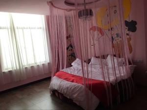 Ένα ή περισσότερα κρεβάτια σε δωμάτιο στο Thank Inn Chain Hotel Hebei Shijiazhuang Luancheng Communication University