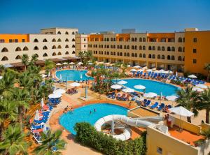 an overhead view of a resort with a swimming pool at Playamarina in Isla Canela
