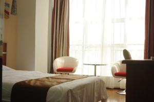 Posteľ alebo postele v izbe v ubytovaní Thank Inn Chain Hotel Hebei Shijiazhuang Zhao Town Shenghua Street