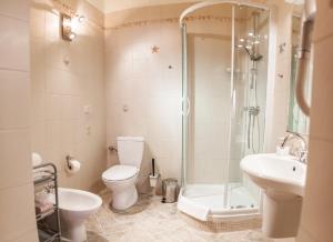 Kúpeľňa v ubytovaní Duval Apartments + 22 fotografií
