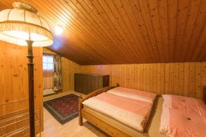 Postel nebo postele na pokoji v ubytování Apartmenthaus Kreuzbuche