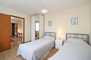 Een bed of bedden in een kamer bij 202 Apartments