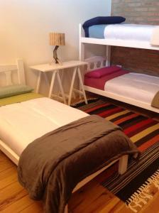 Ein Etagenbett oder Etagenbetten in einem Zimmer der Unterkunft Cabañas Vientos del Sur