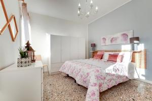 Säng eller sängar i ett rum på Ca' Artisti-S.Margherita