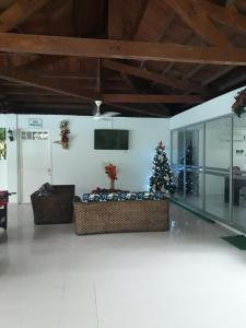TV a/nebo společenská místnost v ubytování girardot resort apto102
