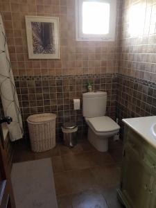 A bathroom at Villa - zeezicht, zwembad