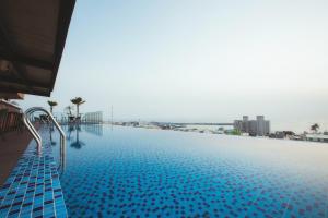 The swimming pool at or close to FangLiao Hotel