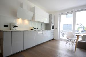 Kuchyňa alebo kuchynka v ubytovaní The View Luxury Apartment Dramalj