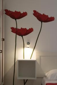 A bed or beds in a room at Residence Villa Ofelia